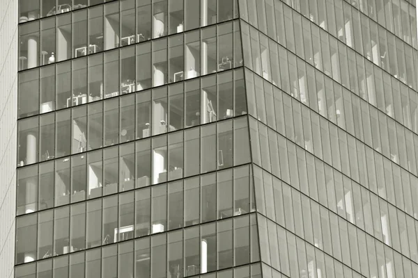 Glass walls of a office building - business background. Black and white.