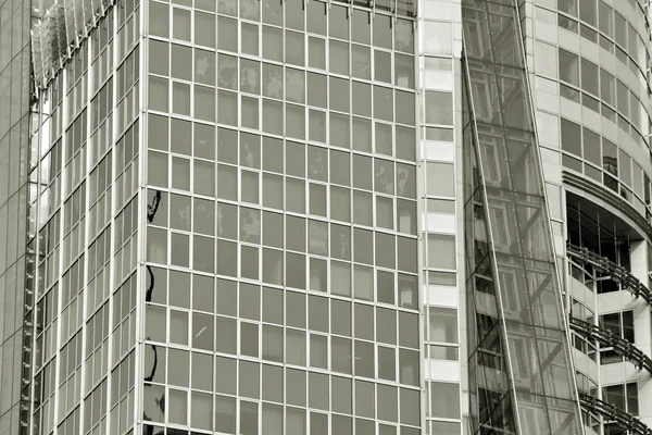 Glass walls of a office building - business background. Black and white.