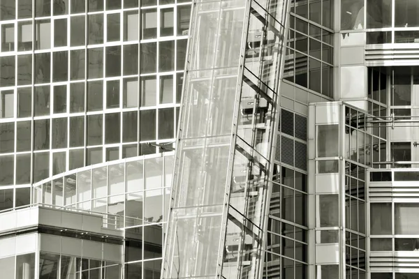 Glass walls of a office building - business background. Black and white.