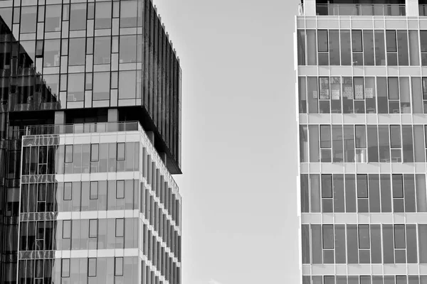 Glass walls of a office building - business background. Black and white.