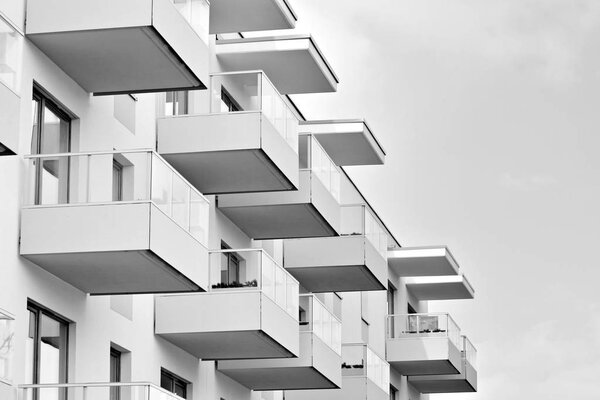 Detail of a new modern apartment building. Black and white.