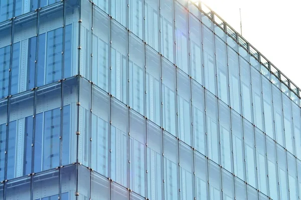 Glass walls of a office building - business background