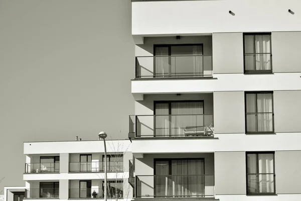 Facade of a modern apartment building. Black and white.