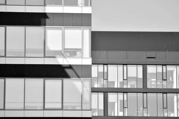 Modern city office building exterior. Black and white.