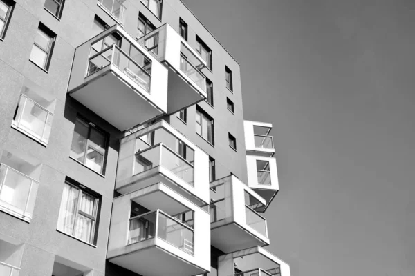 Contemporary apartment building. Generic residential architecture. Black and white.