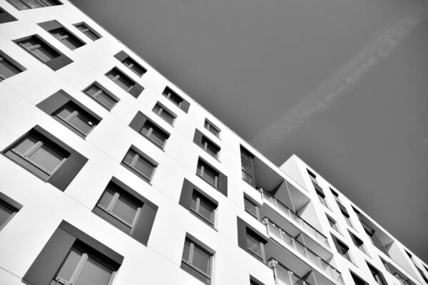 Contemporary apartment building. Generic residential architecture. Black and white.