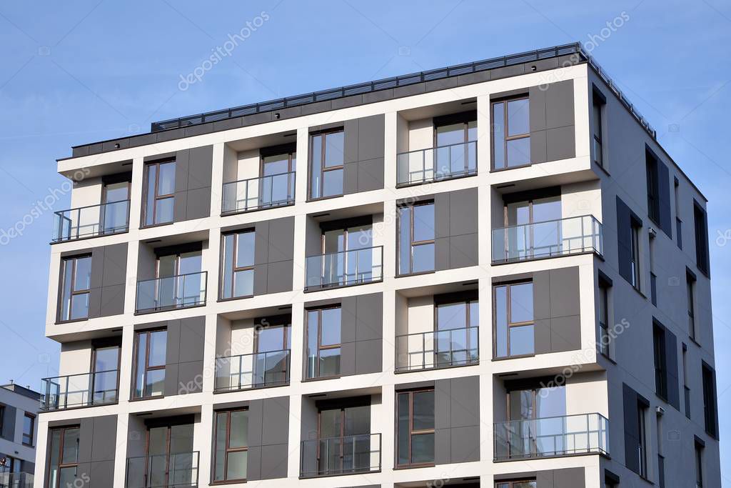 Detail of modern residential flat apartment building exterior. Fragment of new luxury house and home complex.