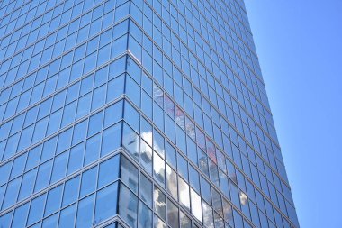 Mavi camlı modern gökdelenlerin soyut dokusu. İş geçmişi.