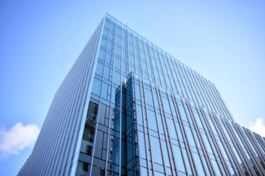 Mavi camlı modern gökdelenlerin soyut dokusu. İş geçmişi.