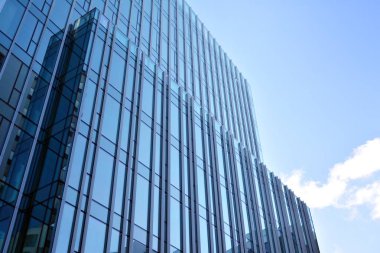 Mavi camlı modern gökdelenlerin soyut dokusu. İş geçmişi.