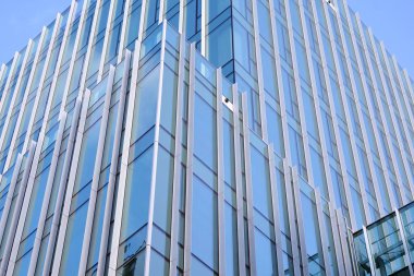 Mavi camlı modern gökdelenlerin soyut dokusu. İş geçmişi.