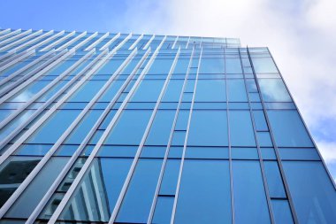 Mavi camlı modern gökdelenlerin soyut dokusu. İş geçmişi.