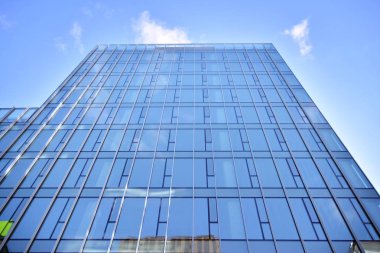 Mavi camlı modern gökdelenlerin soyut dokusu. İş geçmişi.