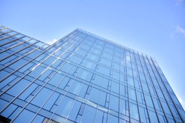 Mavi camlı modern gökdelenlerin soyut dokusu. İş geçmişi.