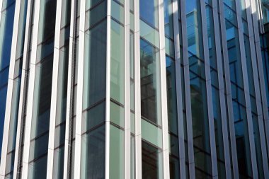 Mavi camlı modern gökdelenlerin soyut dokusu. İş geçmişi.