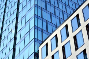 Mavi camlı modern gökdelenlerin soyut dokusu. İş geçmişi.