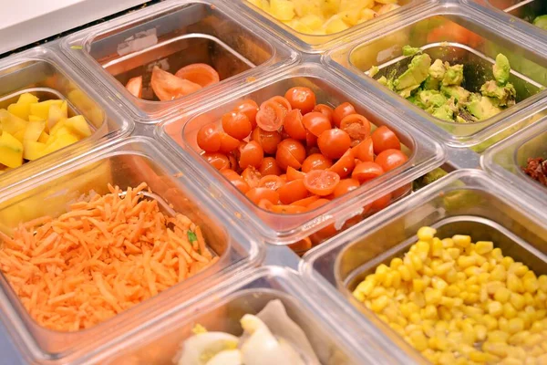 Salad bar with vegetables in the restaurant, healthy food.