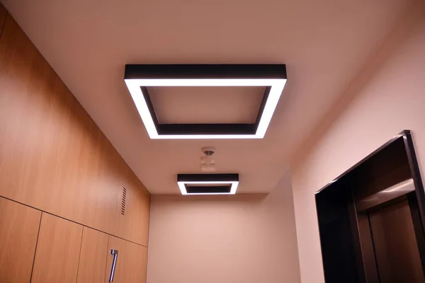 Modern lighting in the hallway of a modern building.Modern flat design. Modern building design.