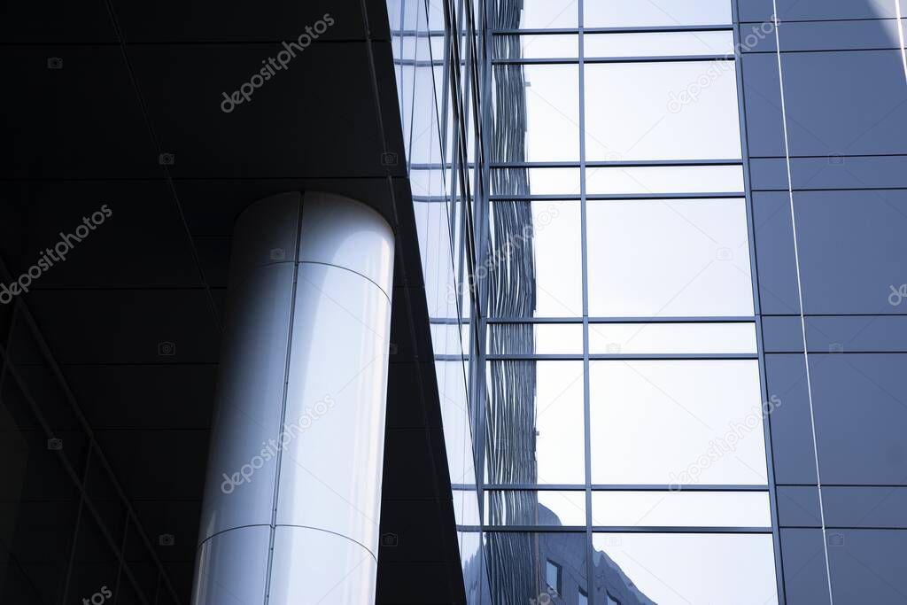 Abstract texture and blue glass facade in modern office building.  
