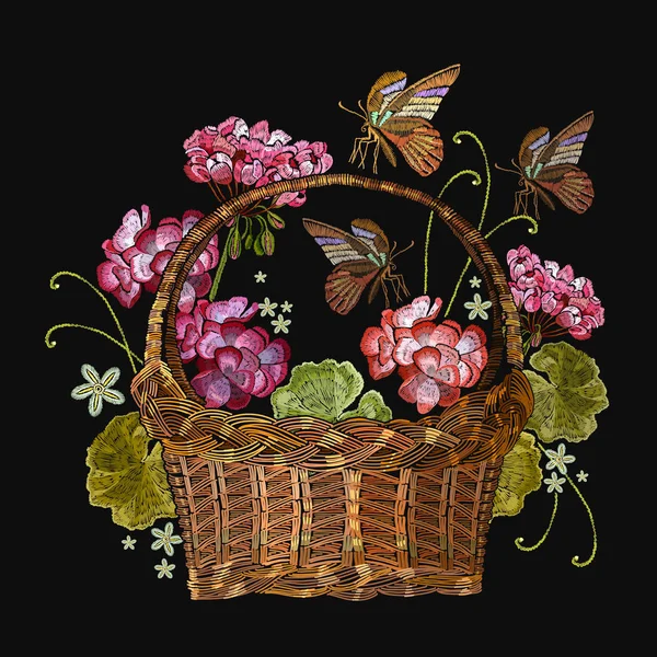 Embroidery geranium flowers and butterfly in a wicker basket