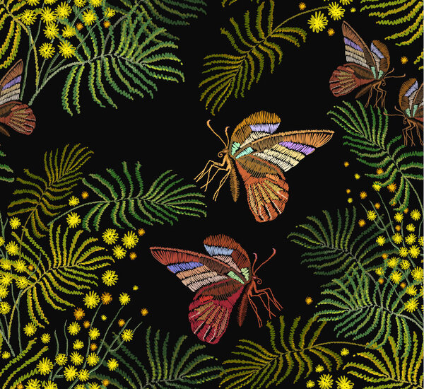 Embroidery mimosa flowers and butterflies seamless pattern