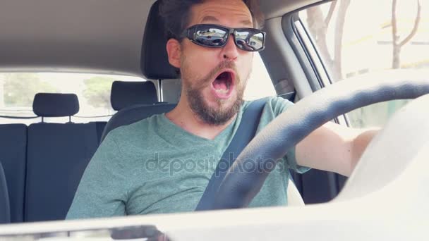 Man feeling stomach sick while driving car slow motion — Stock Video