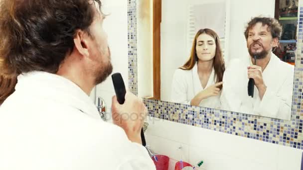 Happy couple dance and sing in bathroom like crazy slow motion — Stock Video