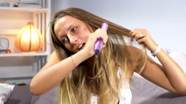 Funny Woman Talking Phone While Straightening Hair — Stock Video