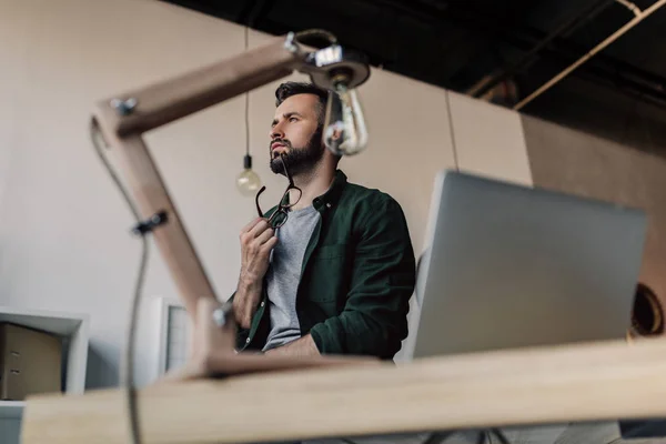 Thoughtful bearded businessman — Stock Photo, Image