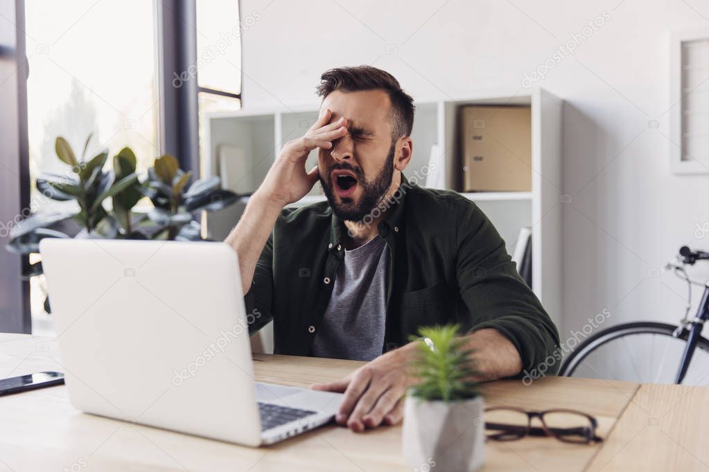 Man using laptop 