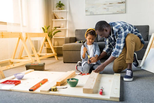 African-american father and son doing renovation — Stock Photo, Image