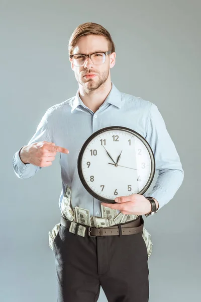 Thoughtful Businessman Pointing Clock Isolated Grey — Free Stock Photo