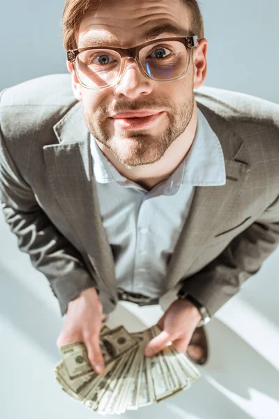 Junger Glücklicher Geschäftsmann Hält Dollarnoten Den Händen — Stockfoto