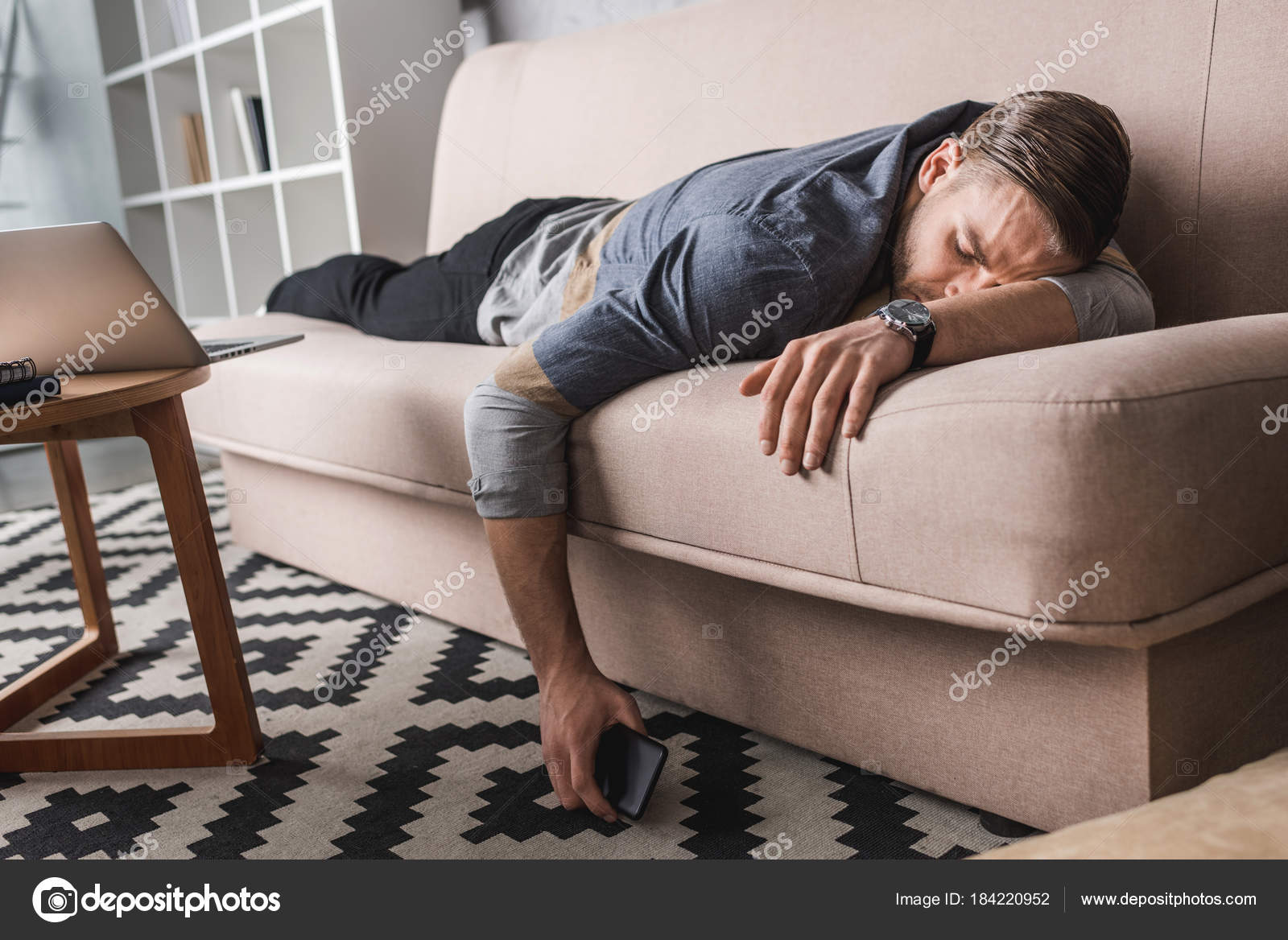 Exhausted Young Man Sleeping Couch Smartphone Hand Royalty Free Photo Stock Image By C Sarkisseysian 184220952