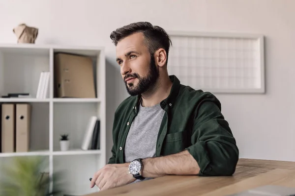 Smiling bearded businessman — Stock Photo