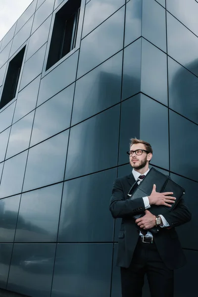 Stylish businessman with briefcase — Stock Photo, Image