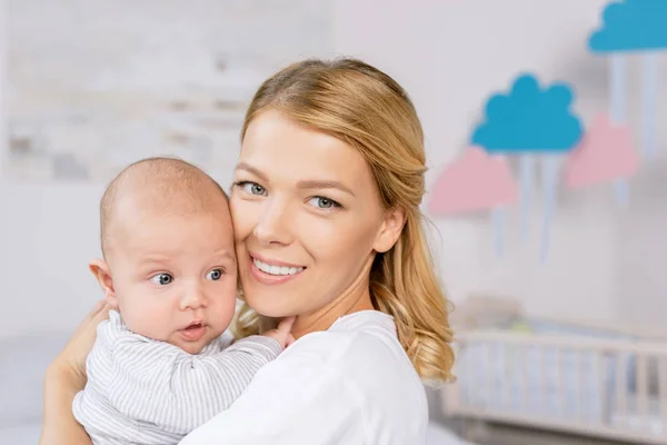 Happy mother and infant son — Stock Photo, Image