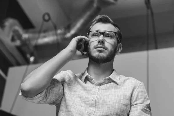 Businessman using smartphone — Stock Photo