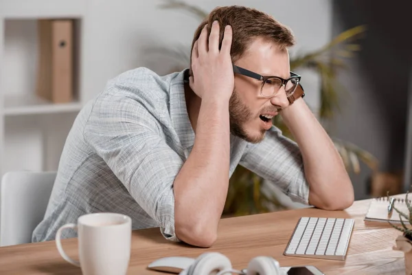 Stressed caucasian businessman — Stock Photo