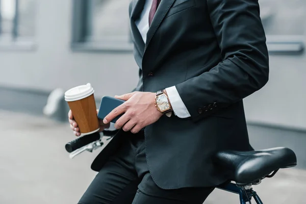 Businessman using smartphone — Stock Photo