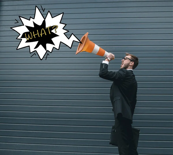 Businessman with traffic cone — Stock Photo