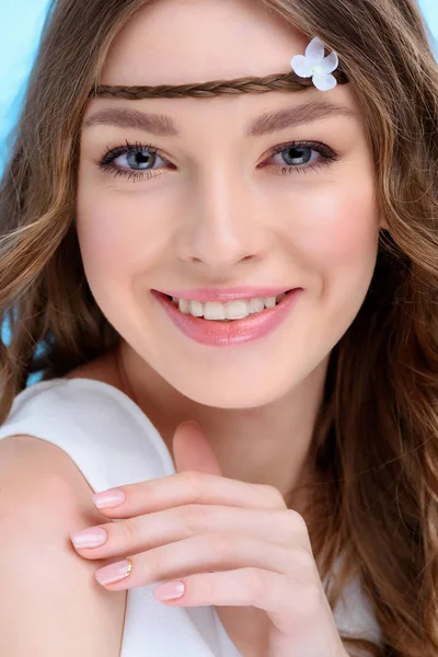 Close-up shot of happy young woman with curly hair — Stock Photo