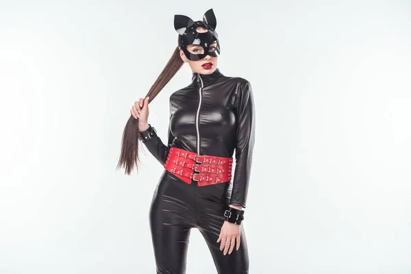 Seductive young woman on sexy catsuit and mask isolated on white — Stock Photo