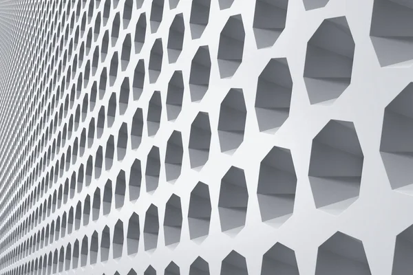 Parede frontal exterior do edifício industrial decorada com nichos hexagonais — Fotografia de Stock