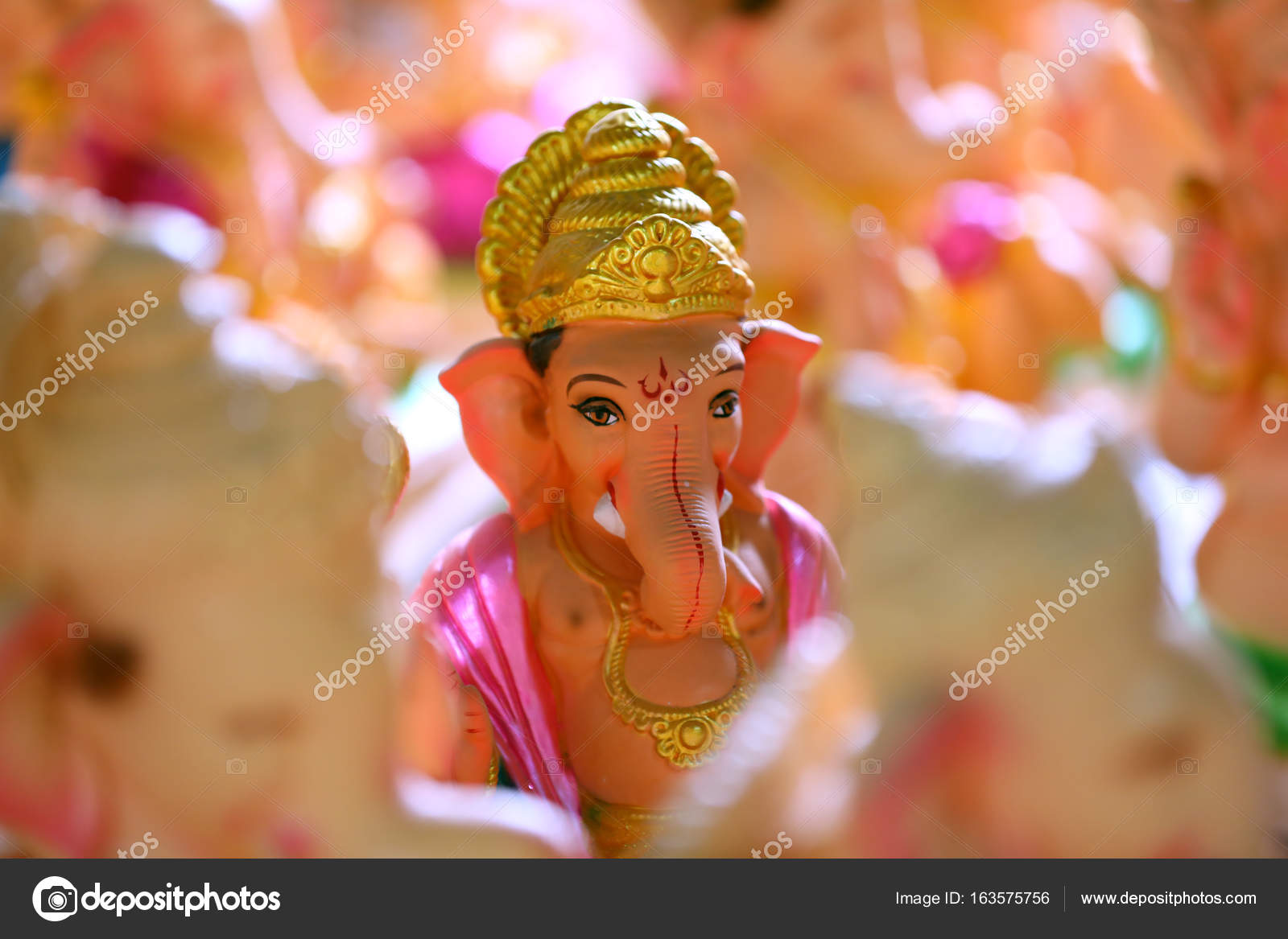 Lord ganesha statue in plaster of paris Stock Photo by 163575756