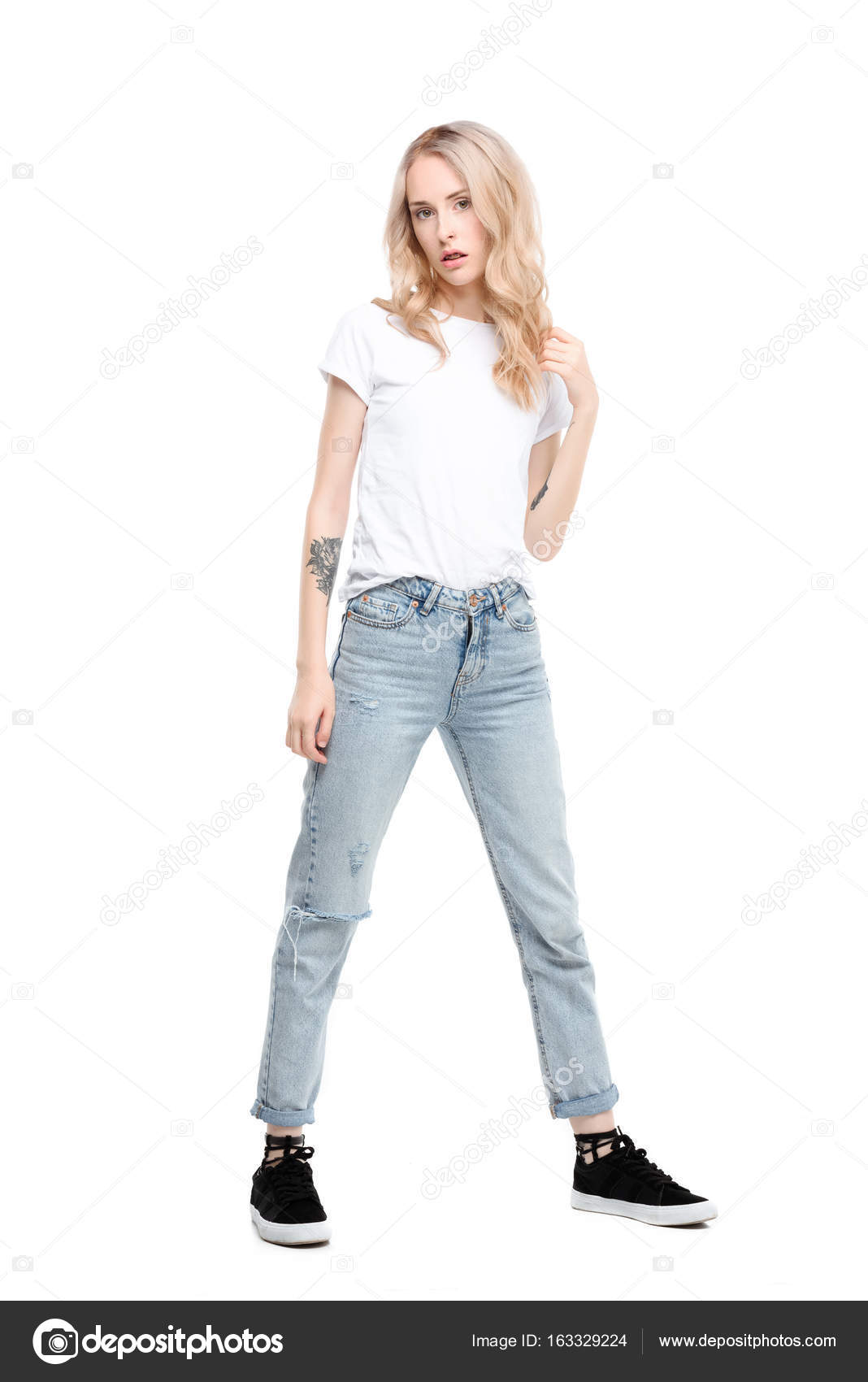 Young woman wearing casual clothes Stock Photo by ©AndrewLozovyi 163329224