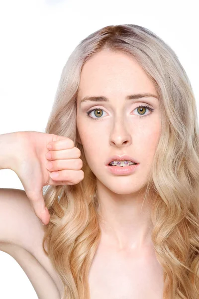 Woman showing thumb down — Stock Photo, Image