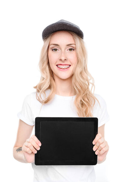 Woman holding digital tablet