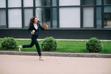 businesswoman running to work clipart
