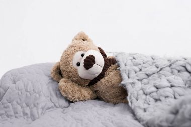 teddy bear in bed clipart